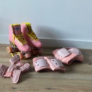 Pink size 9 Impala quad skates and matching rose gold pads set